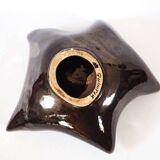 Ceramic star emptier