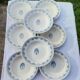 8 assiettes creuses en faïence F J avec frise et bouquet central