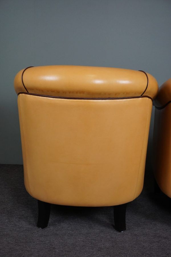 Set of 2 club chairs in blond sheepskin