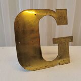 Letter "G" in brass