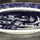 Blue enamelled earthenware wall plate with fisherman decor, Boch La Louvière, Belgium
