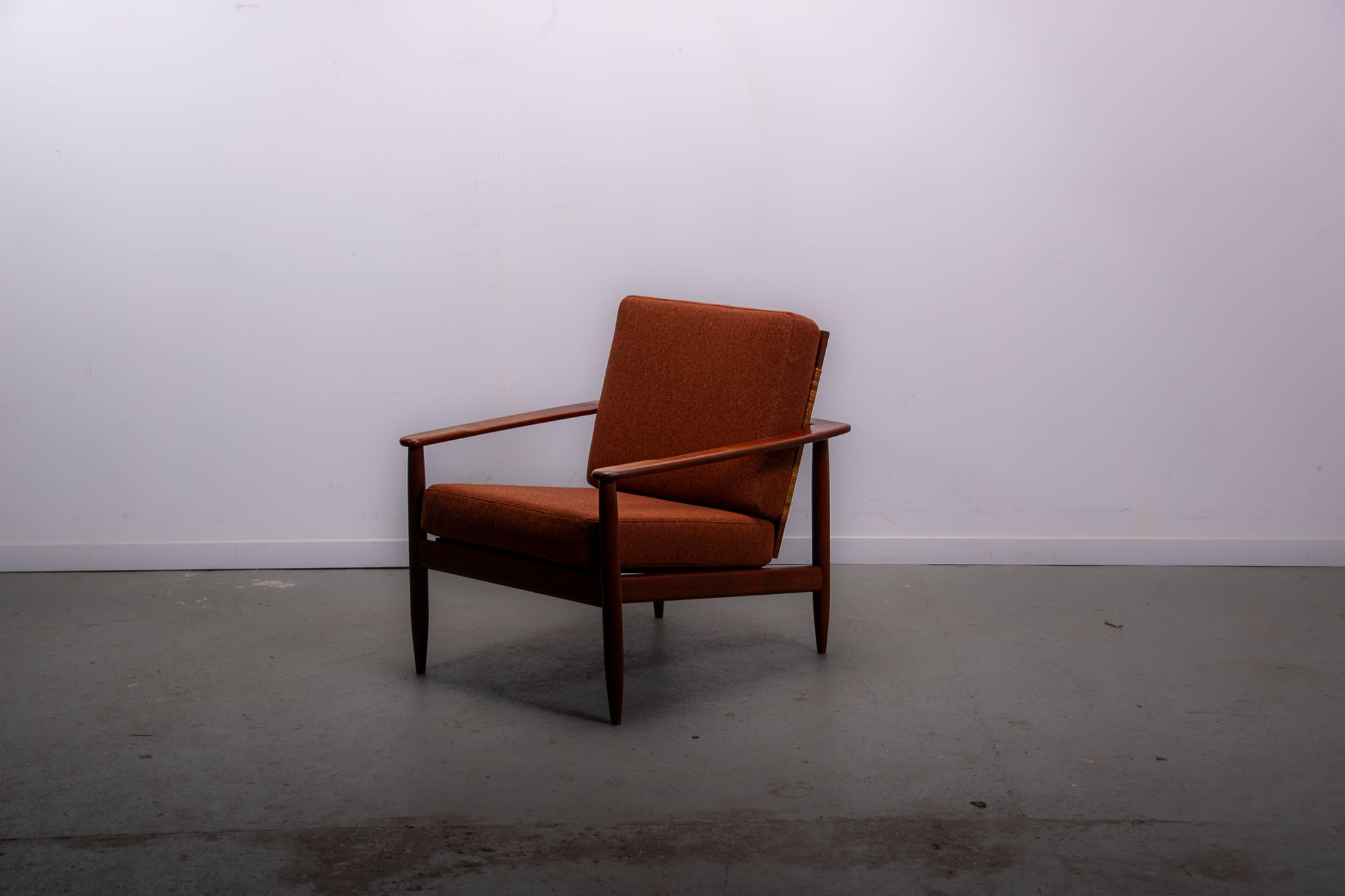 Mid-century easy chair in teak and cane circa 1970
