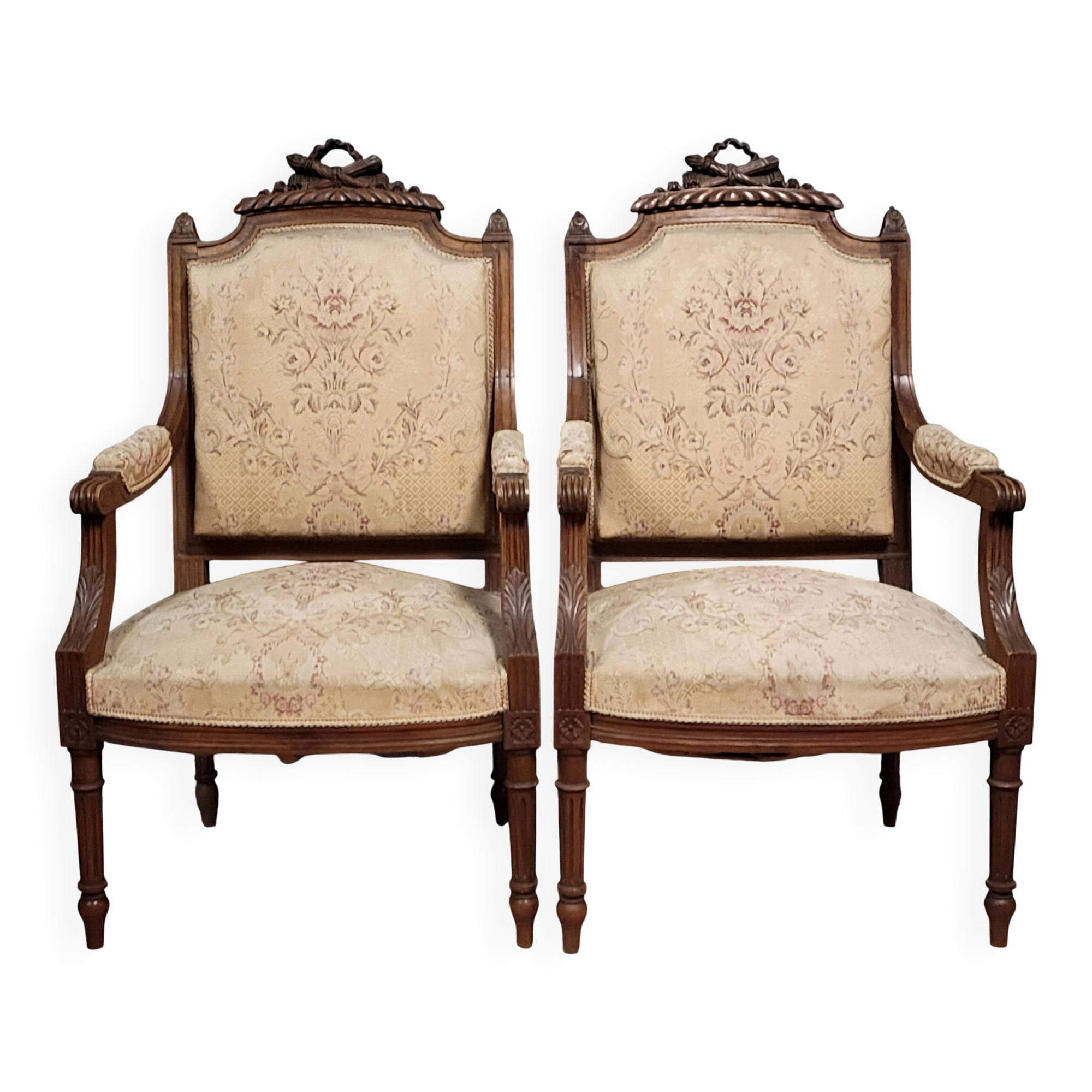 Pair of finely carved armchairs in the Louis XVI style