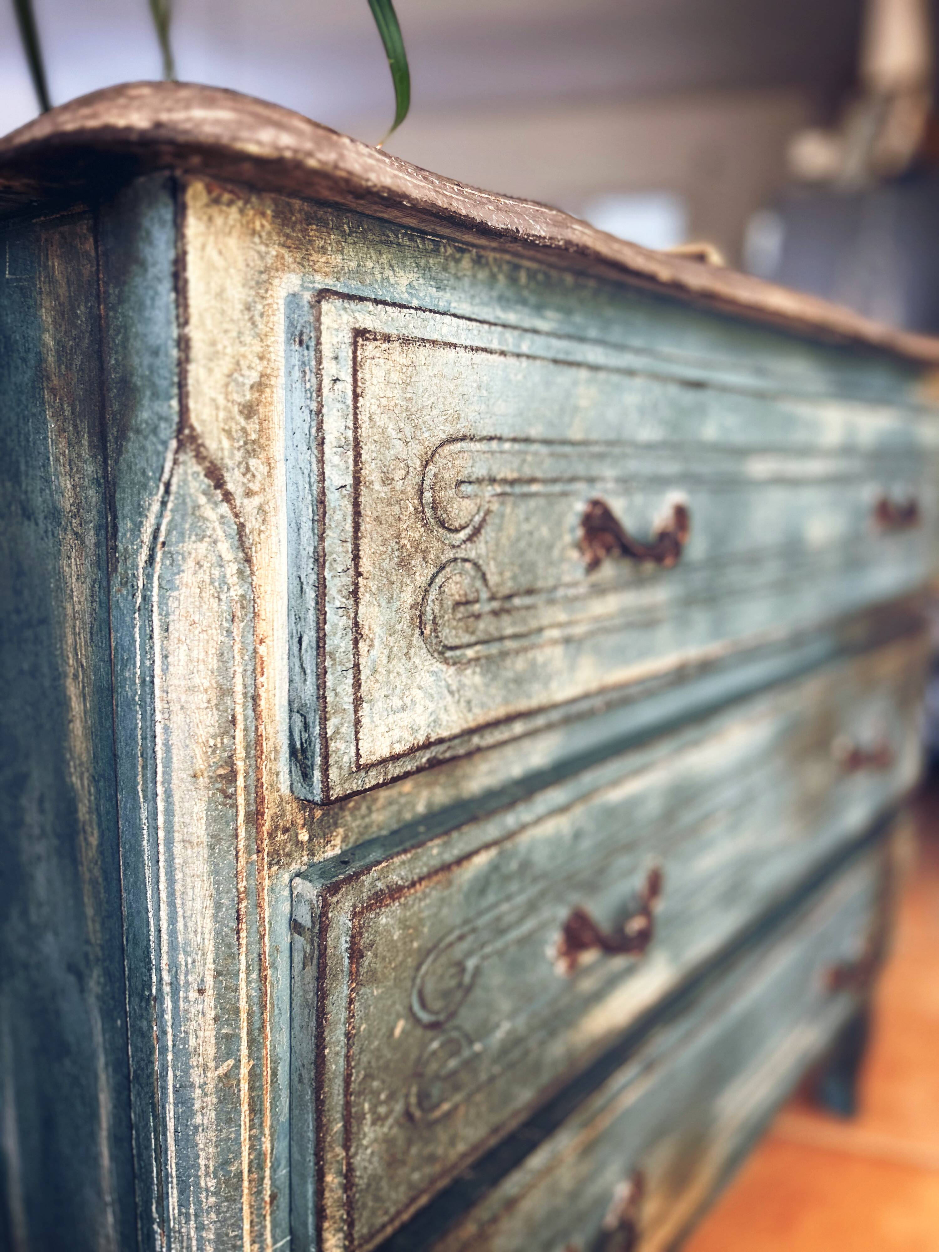 Antique commode with a patina in the Tuscan technique.