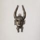 Handcrafted bronze wall mask, Sénoufo African art.