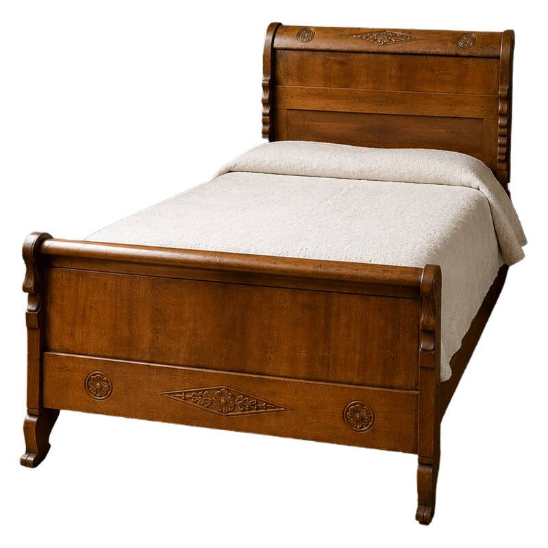 Sculpted walnut boat bed – Directoire period, around 1800
