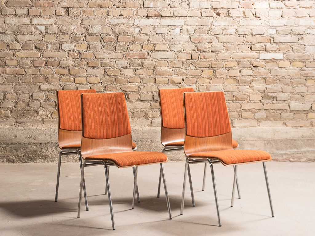 Set of 4 vintage chairs with a chrome steel base, teak backrest and seat