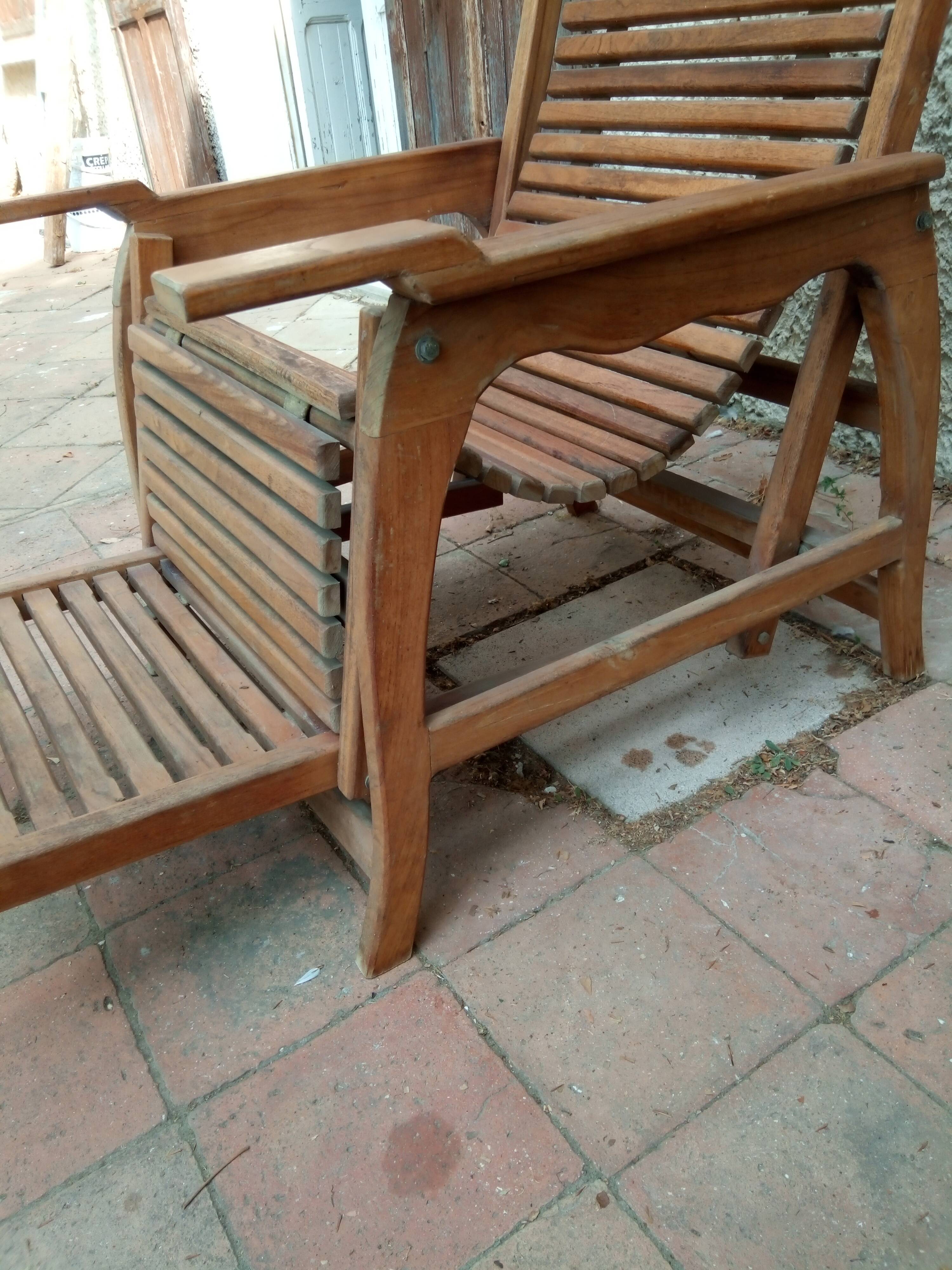 Teak stretchy long chair.