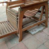 Teak stretchy long chair.