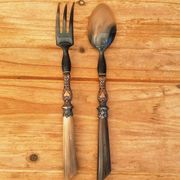 Vintage serving cutlery in horn and wrought metal