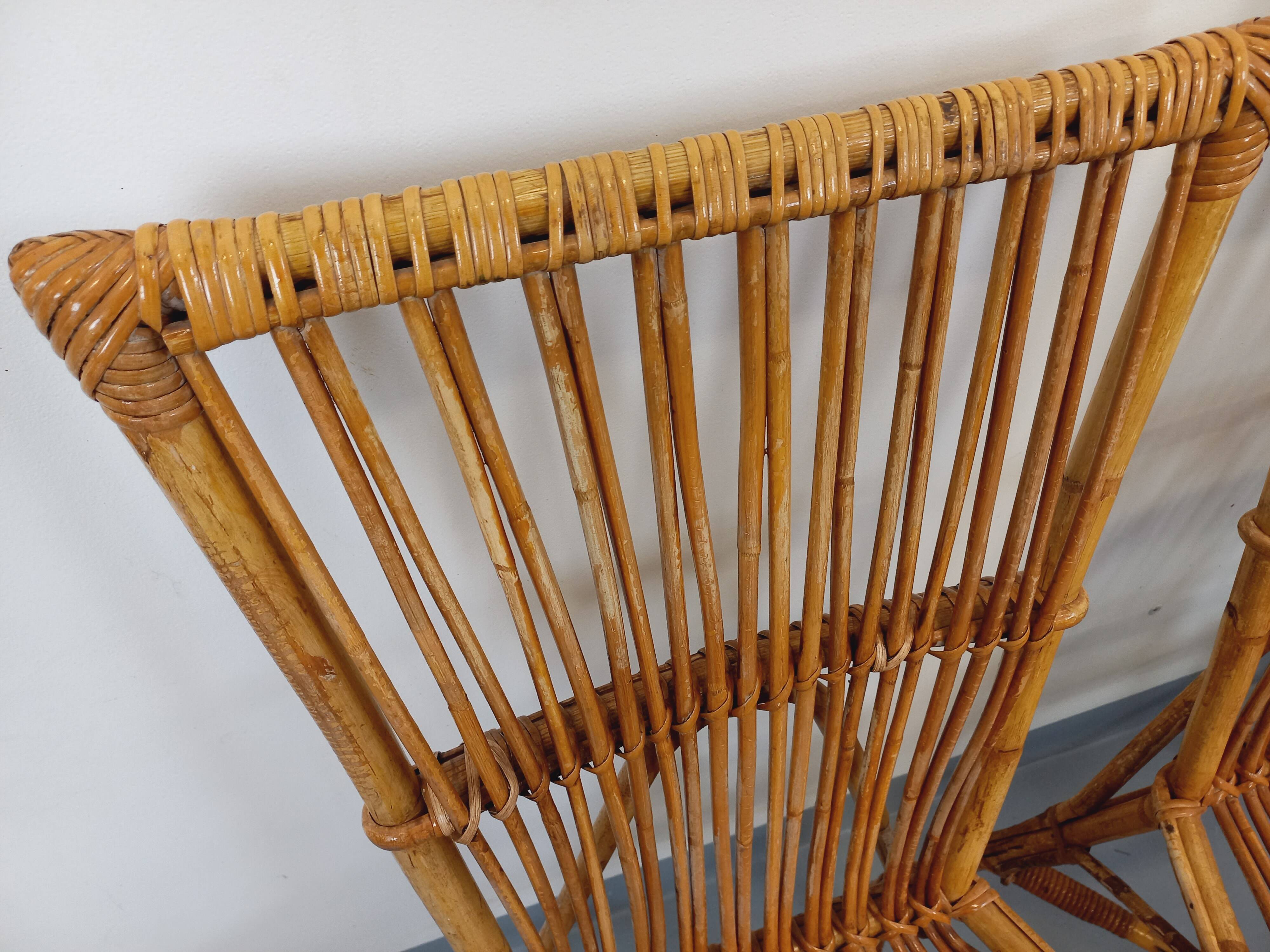 Set of 4 vintage Audoux Minet rattan chairs from the 1950s and 60s.