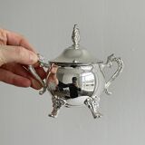 Antique shiny metal sugar bowl