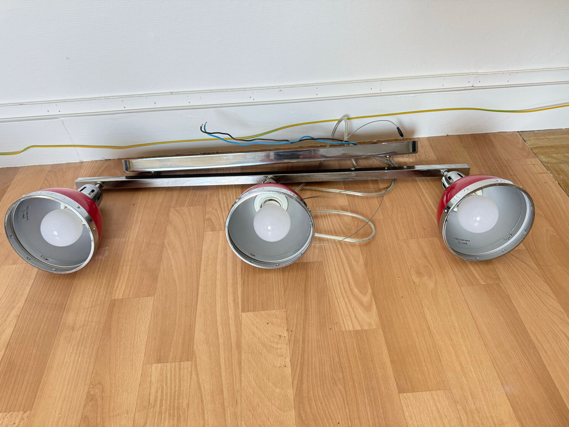 Designer pendant light with 3 red and chrome spots