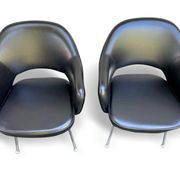 Pair of "Conference" armchairs by Eero Saarinen for Knoll International, black and chrome