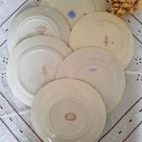 Pitted old flat earthenware plates with gold