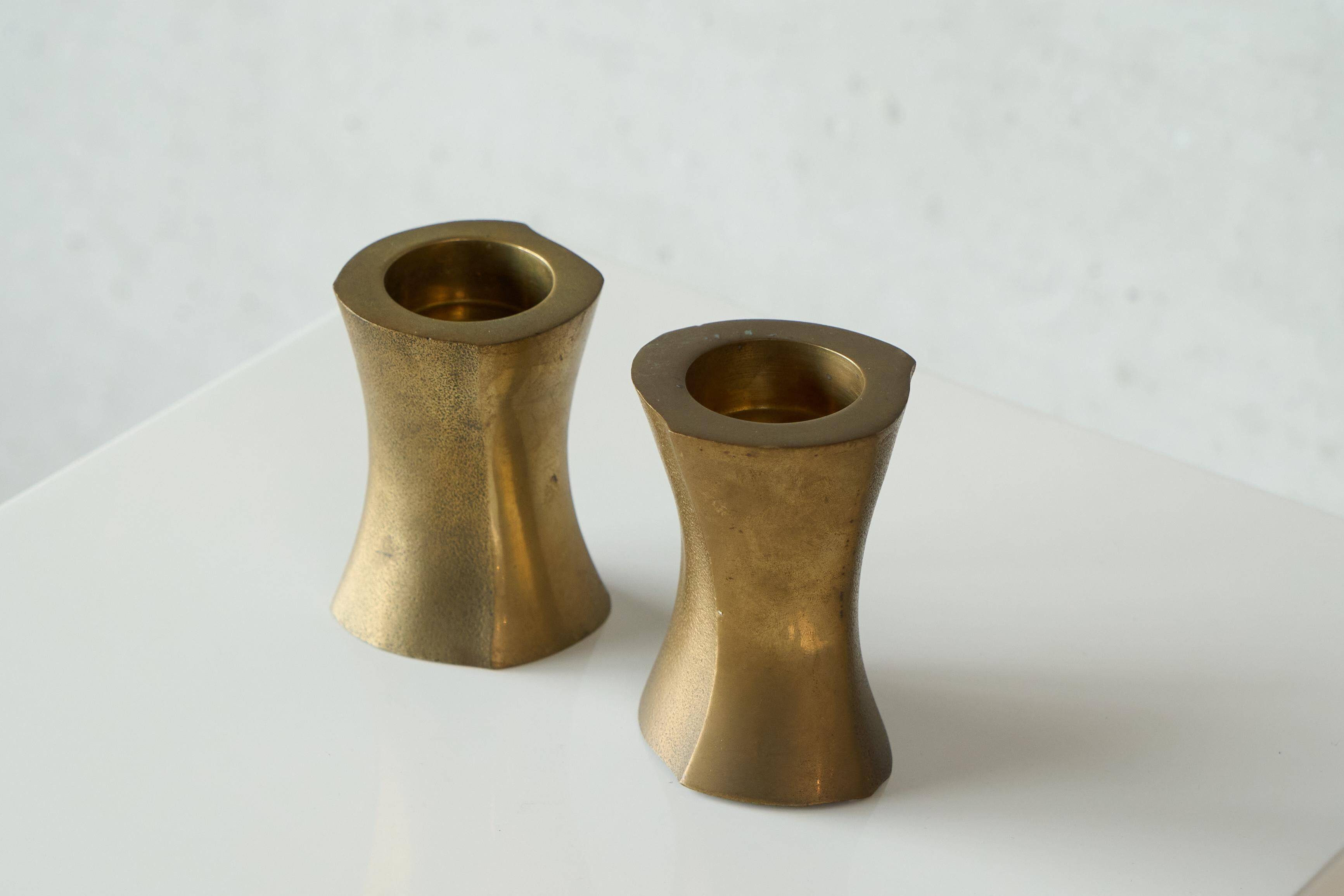 Brutalist pair of solid brass candlesticks from the 1970s.