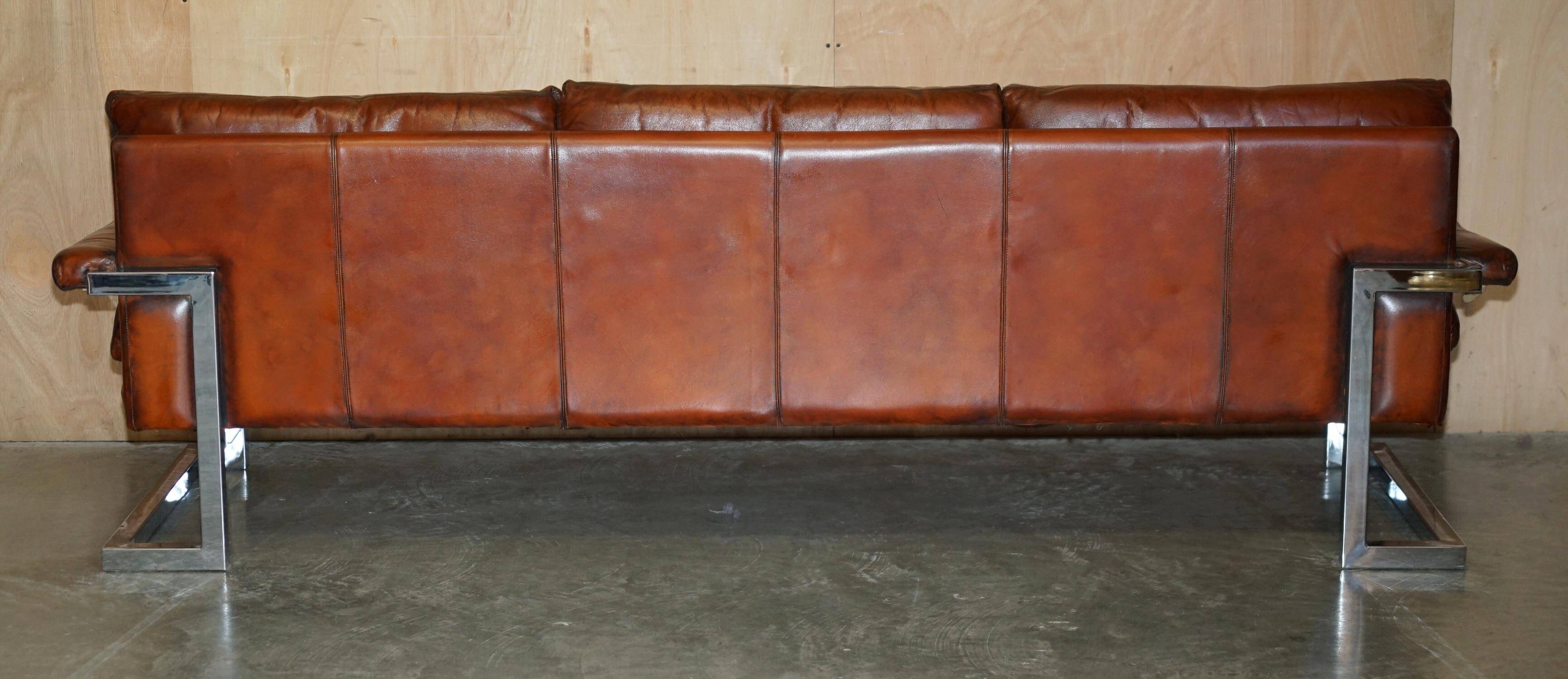 Restored suite Tim Bates for Pieff Mandarin leather chrome hardwood.