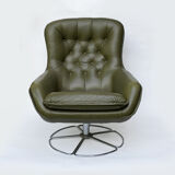Swivel armchair in olive green leather 1970s