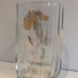 Glass vase with a decoration of a golden flower, around 1970.