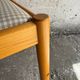 Set of 4 Scandinavian dining chairs in light wood.