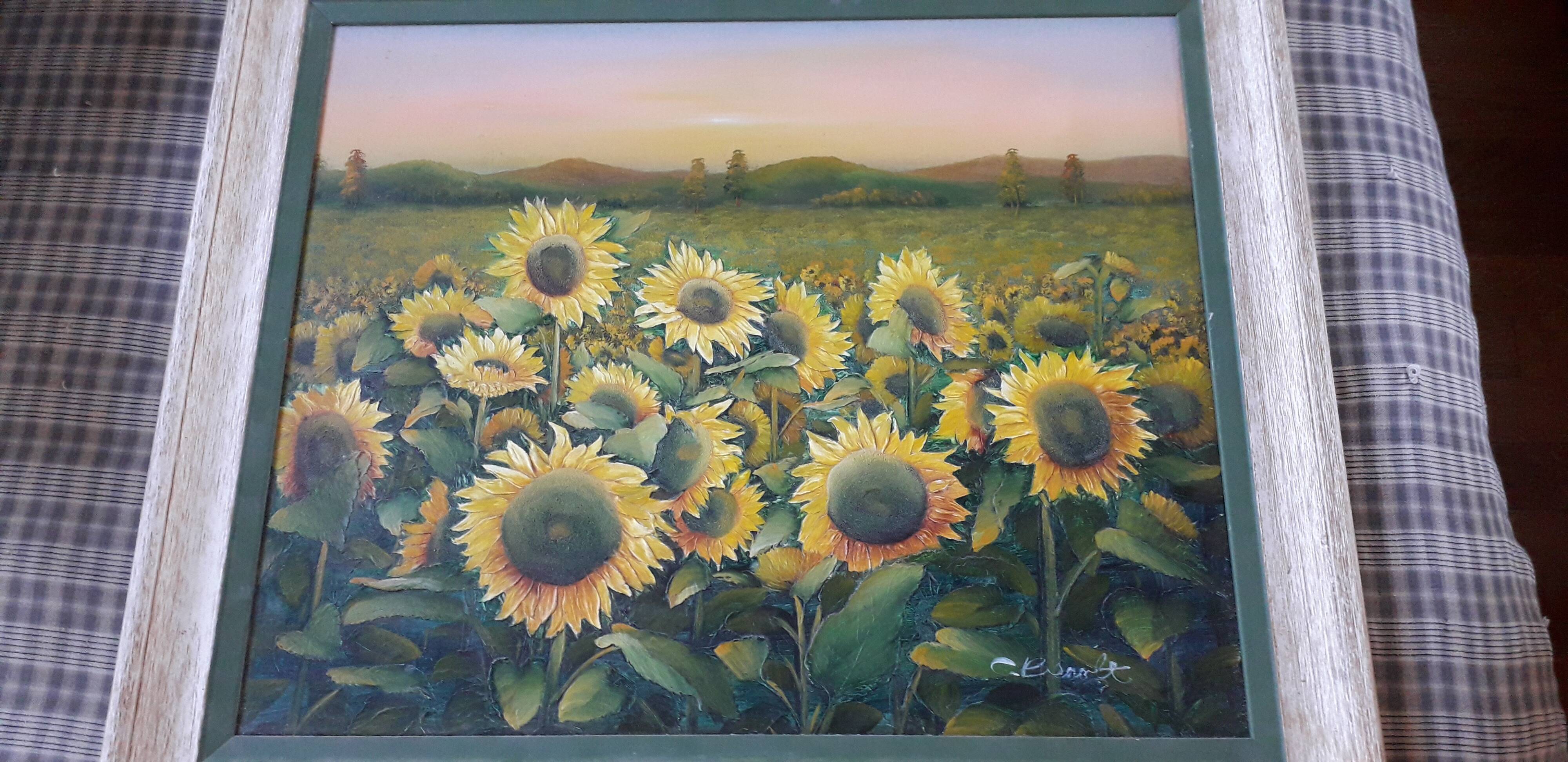 Vintage oil painting depicting a sunflower landscape