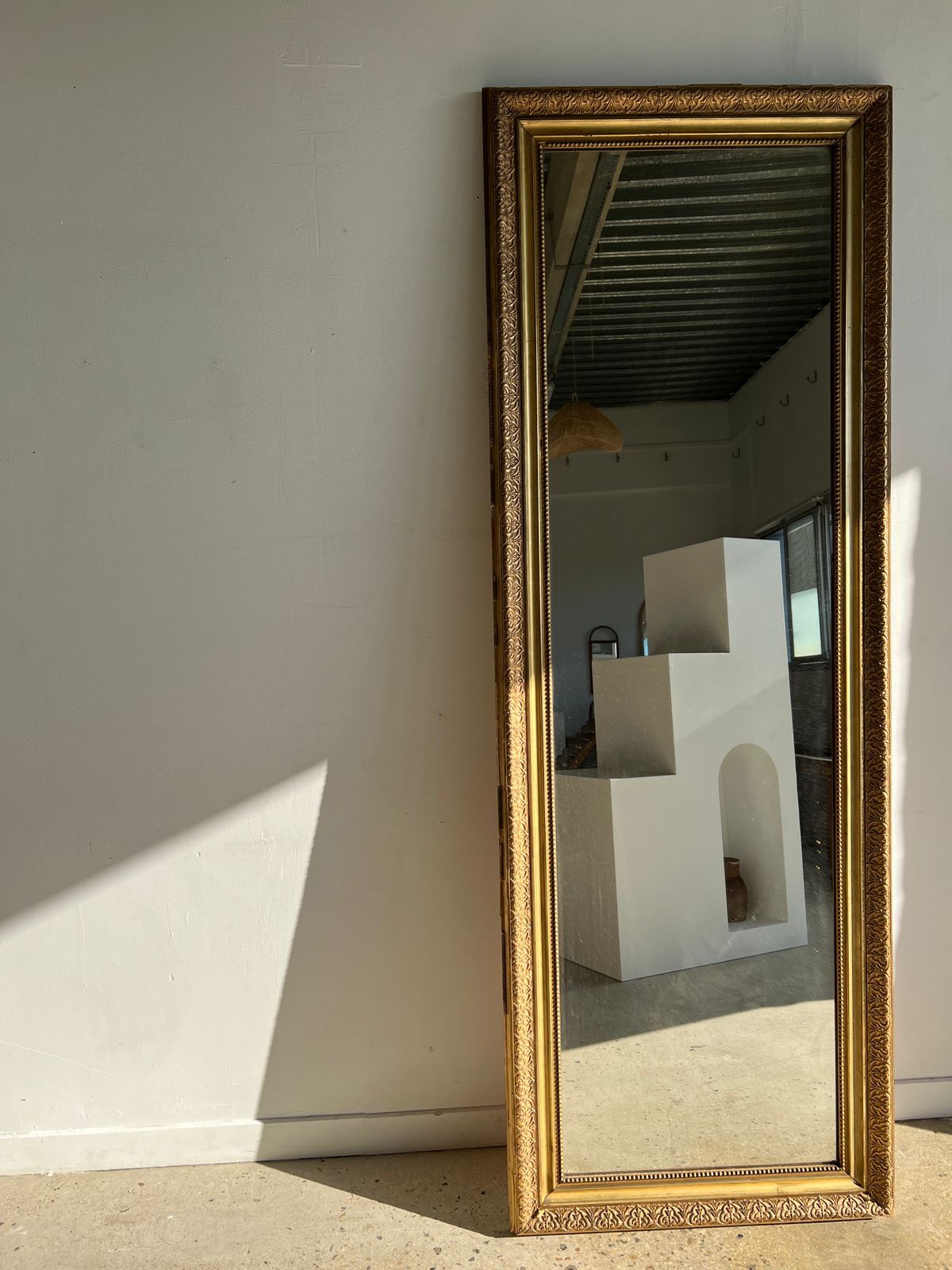 Gilded mirror with frieze h2m10 l:73cm