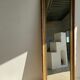 Gilded mirror with frieze h2m10 l:73cm