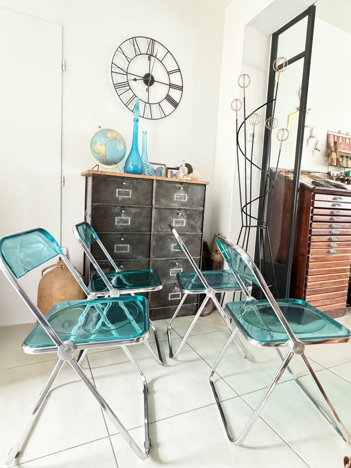 Set of 4 blue Plia folding chairs by Castelli