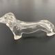 8 porte-couteaux en plastique, années 70, forme teckel