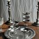 Two large antique silver-plated metal candlesticks, H30