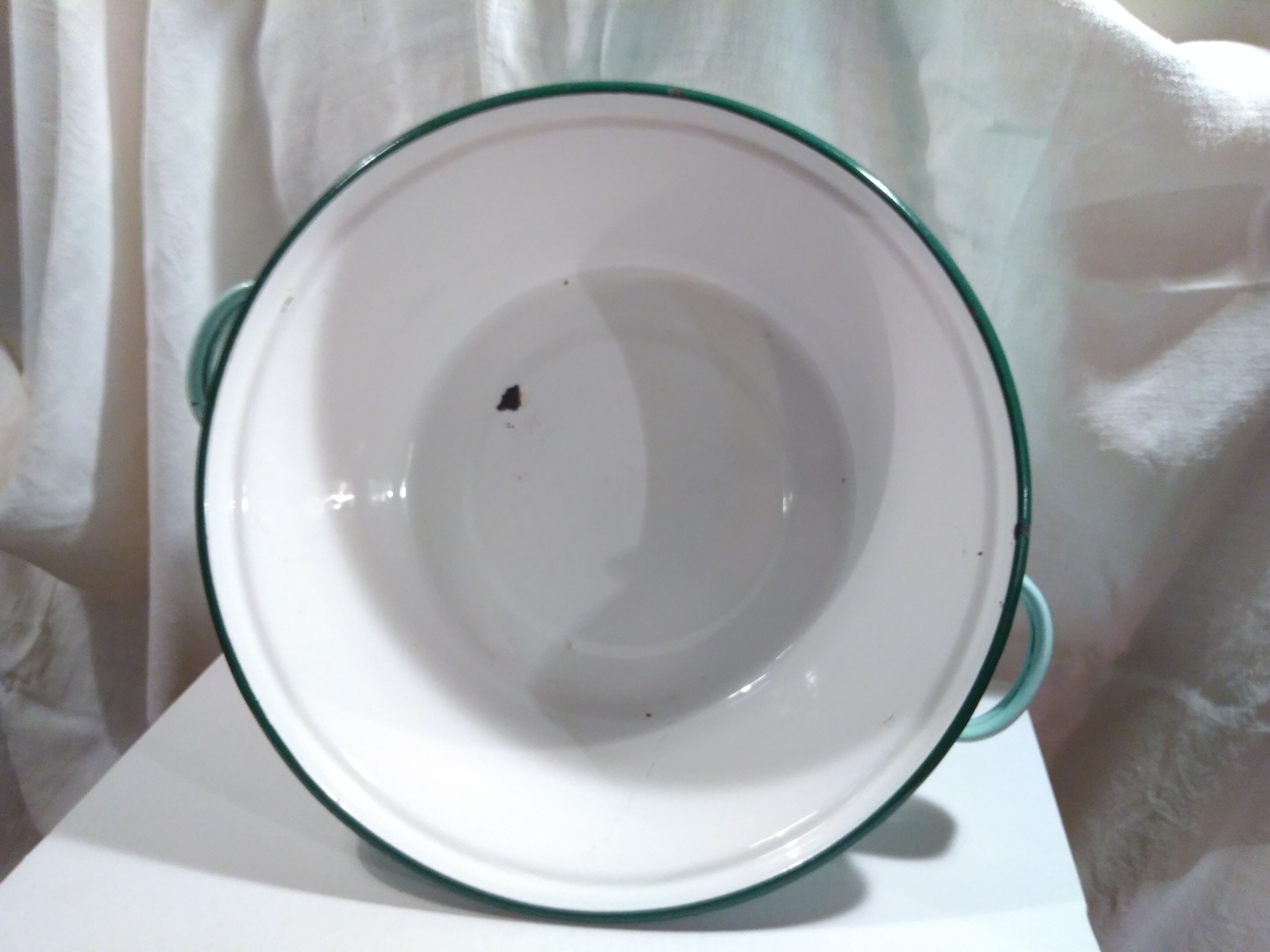 Ancient enamelled sheet metal basin