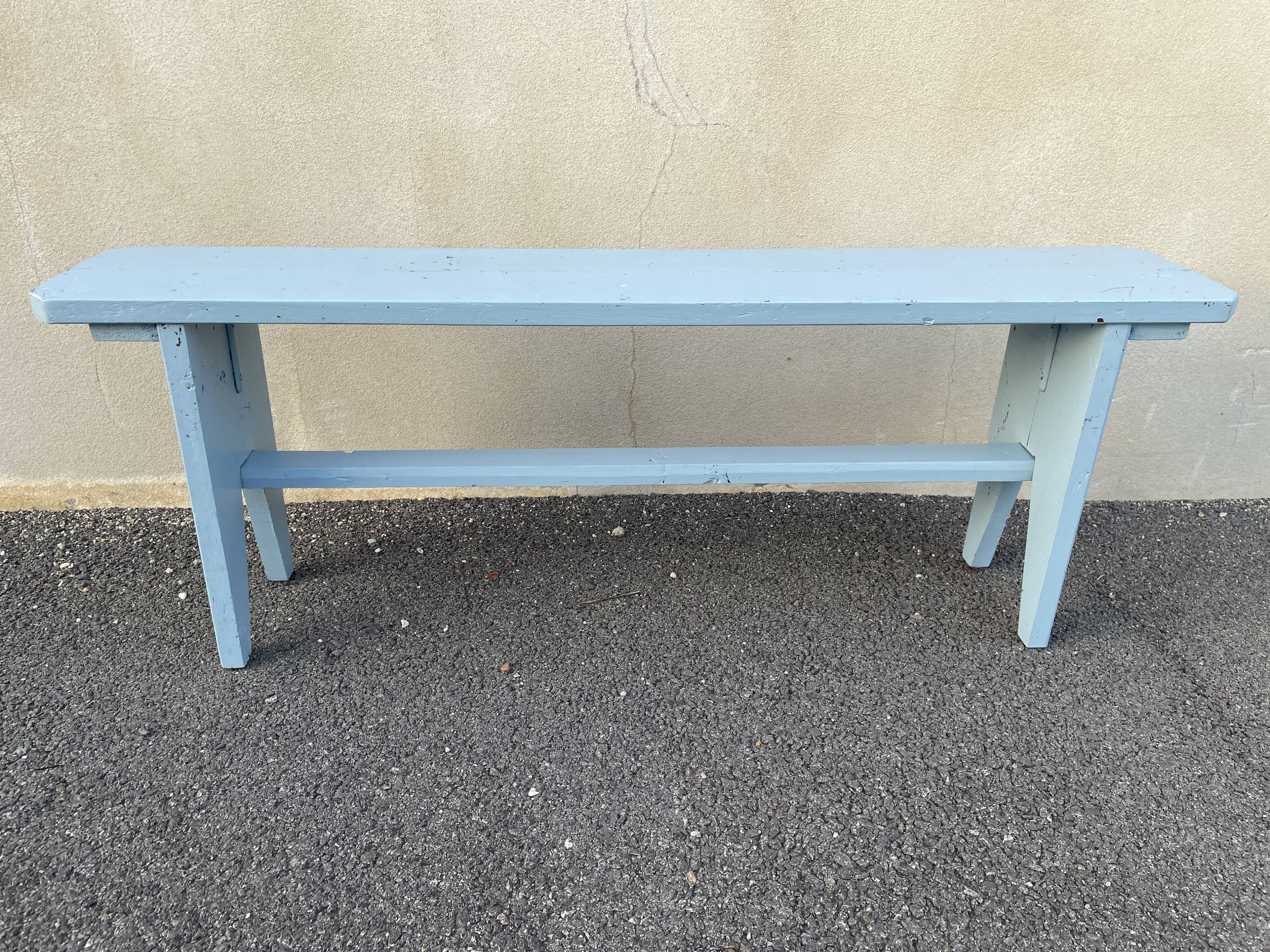 Blue painted wooden bench
