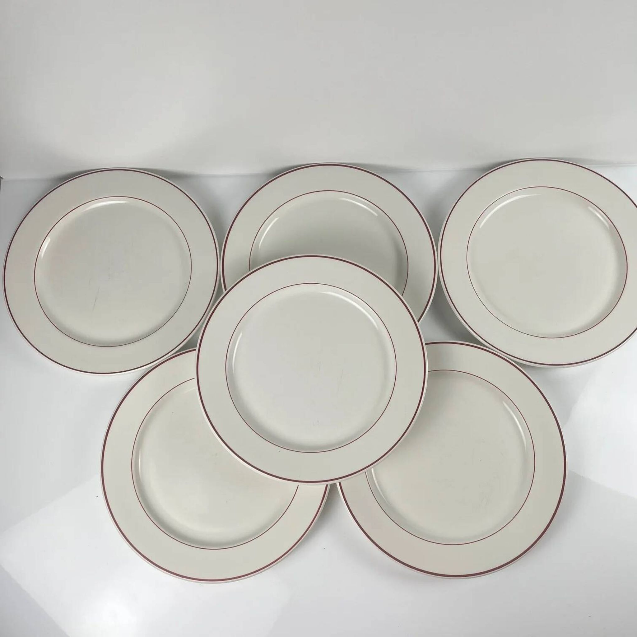 Set of 6 flat plates Villeroy & Boch, burgundy/purple rim, 20th century.