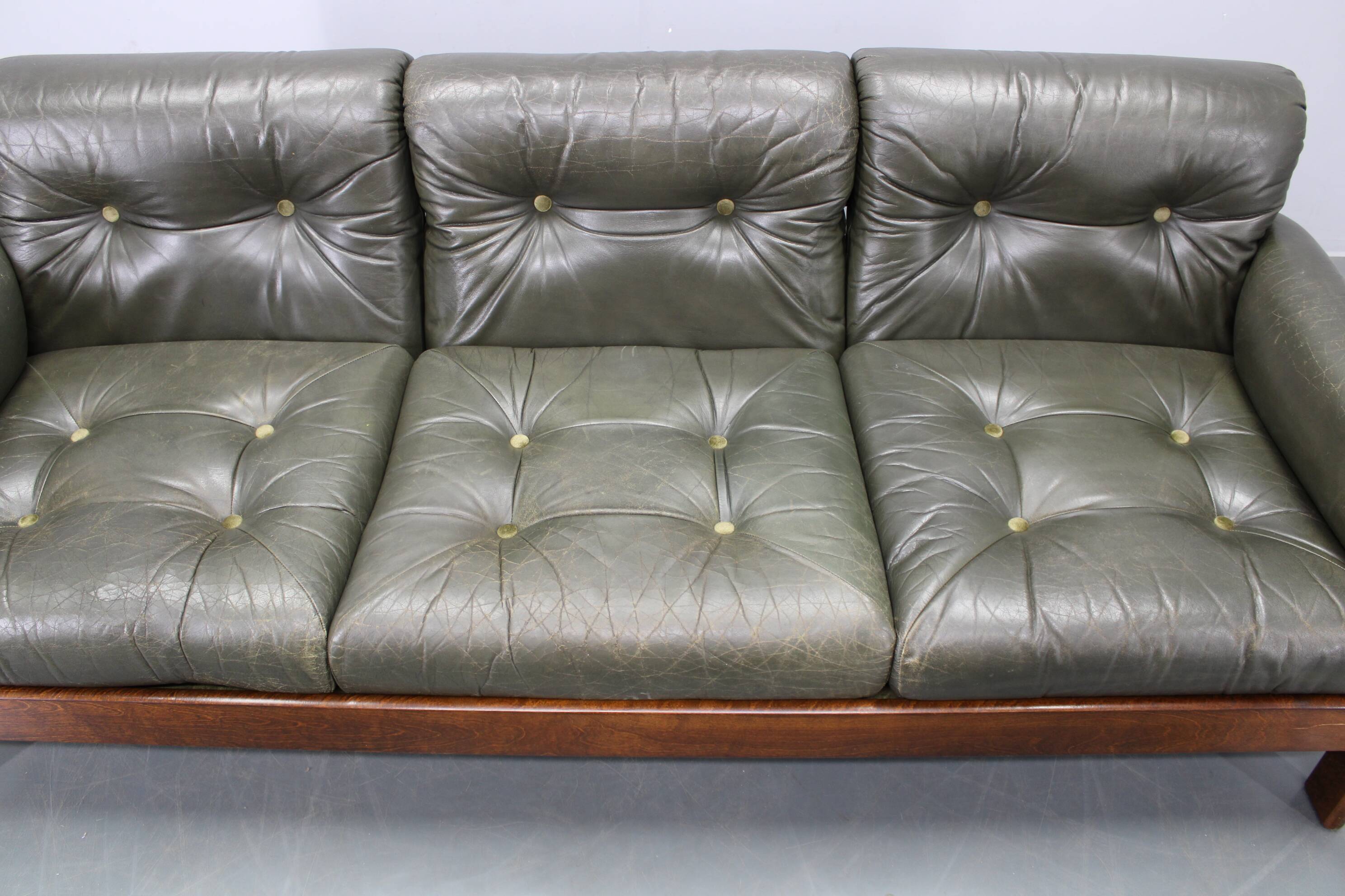 Mid-century Czechoslovak green leather sofa, 1970s