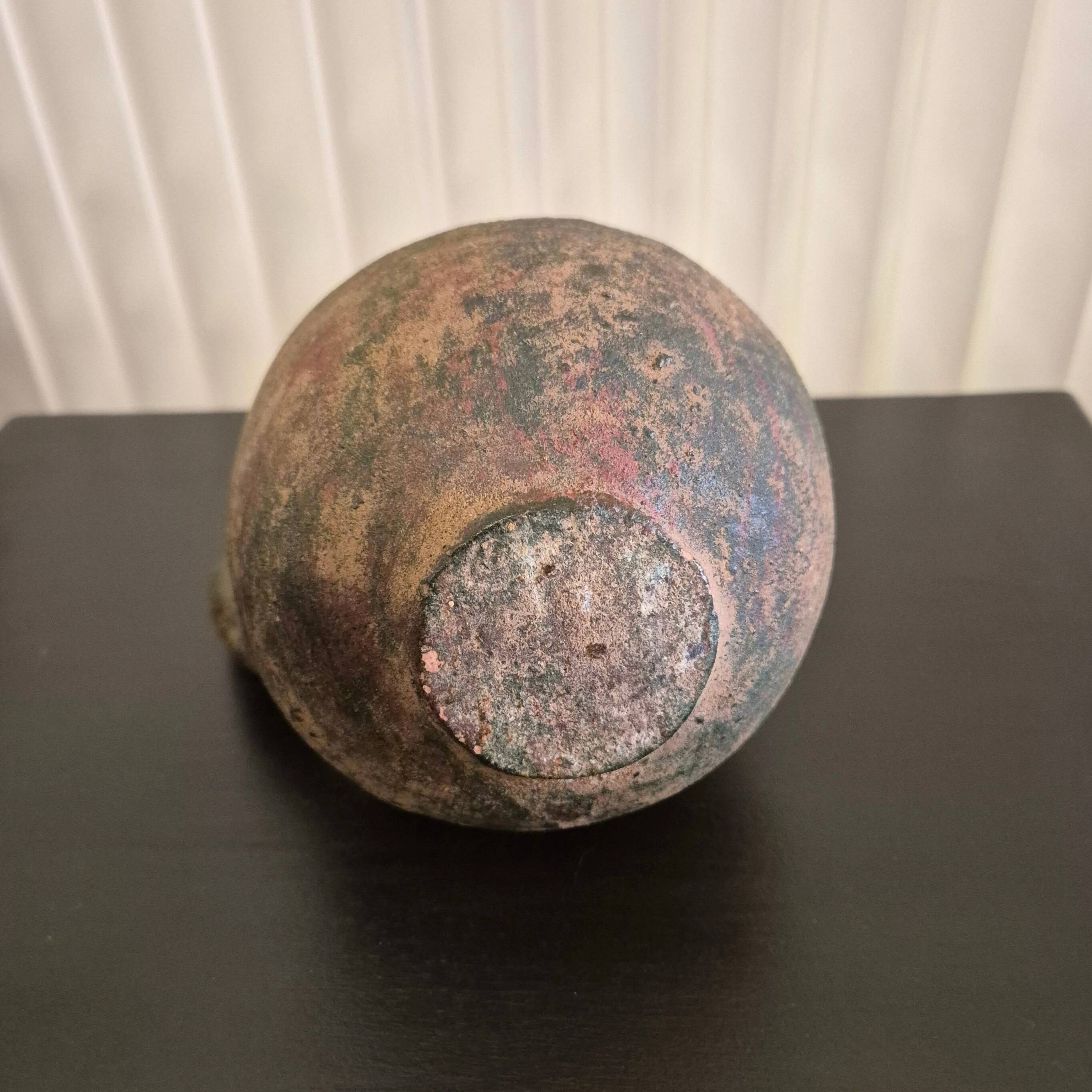 Ancient terracotta jug