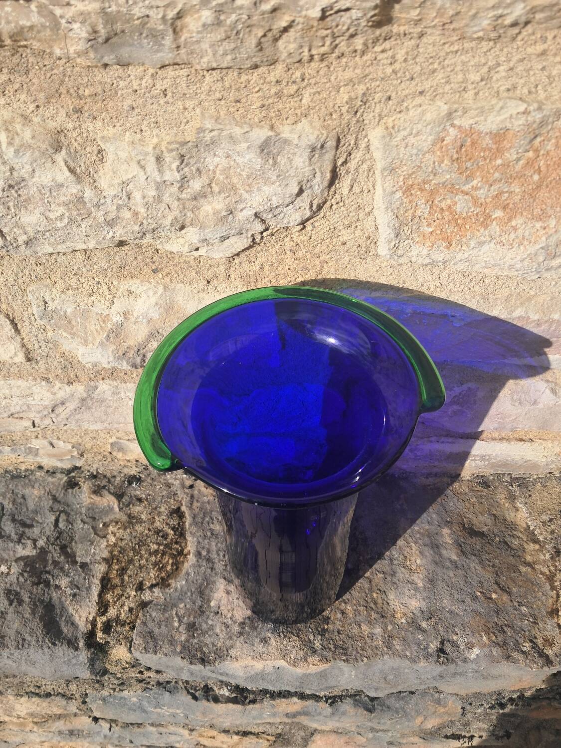 Blue blown glass vase.