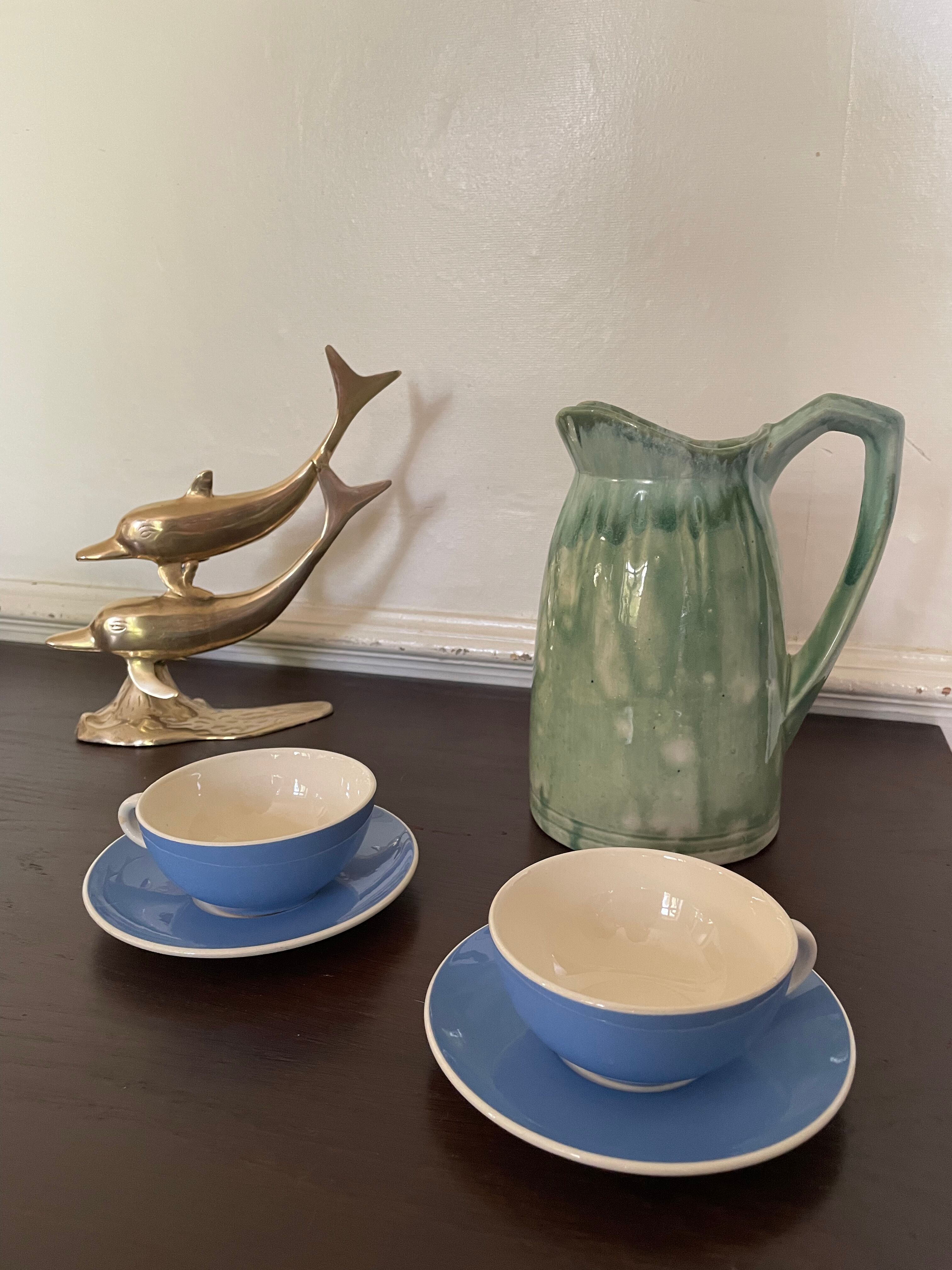 Turquoise green enamelled ceramic pitcher