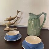 Turquoise green enamelled ceramic pitcher