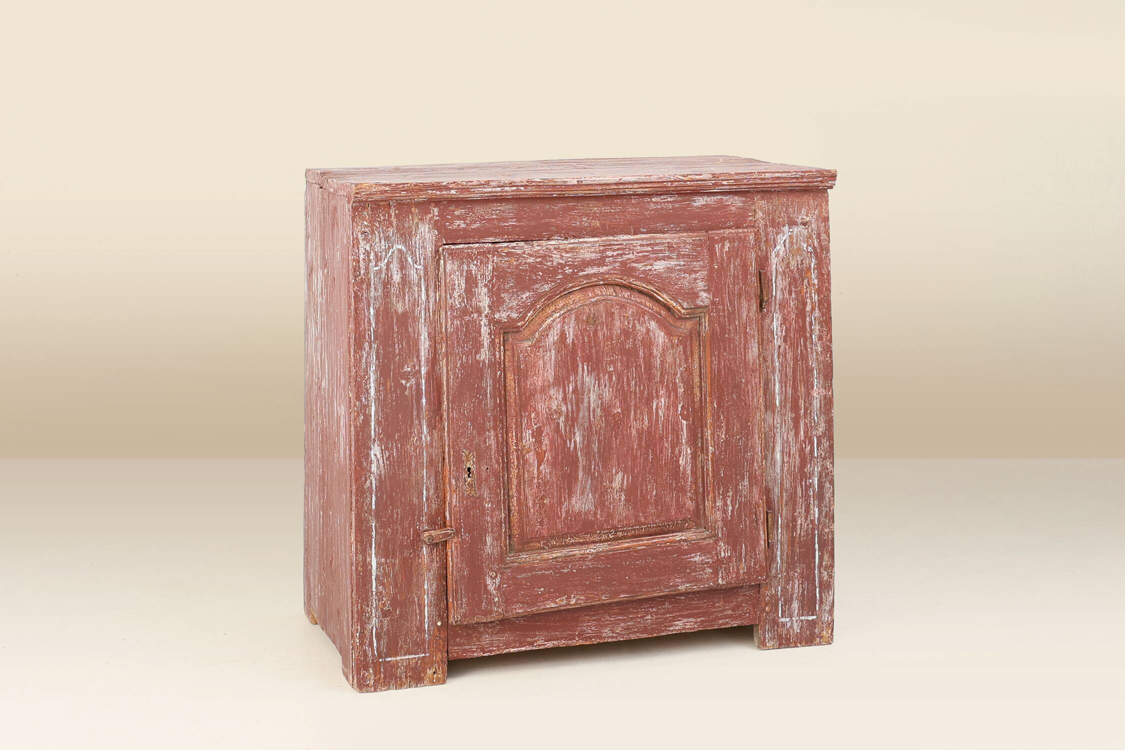 Rustic Parisian cabinet in pine wood with old burgundy paint layers, ca. 18