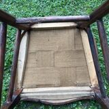 Old wooden chair with upholstered seat