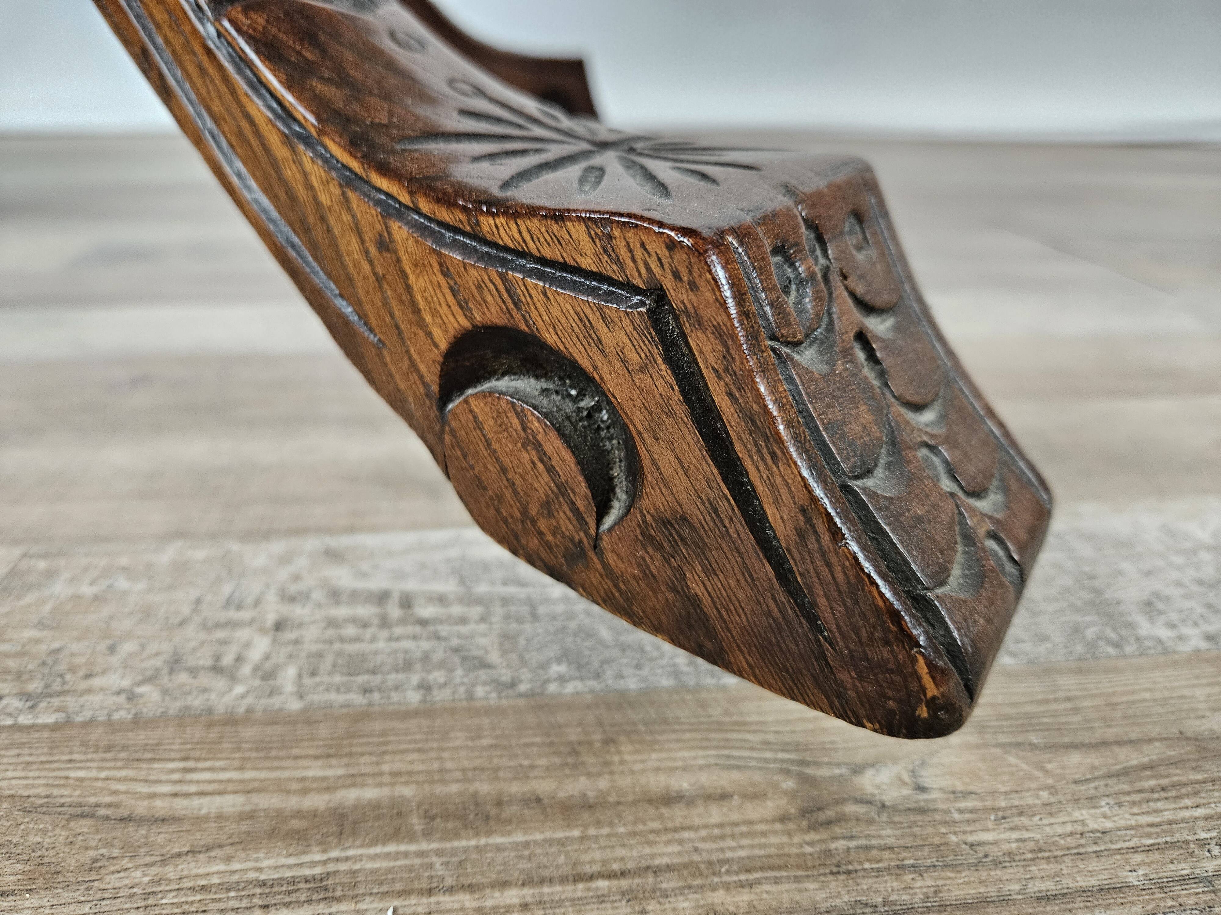 Coffee table in walnut with maple inlays and wheels