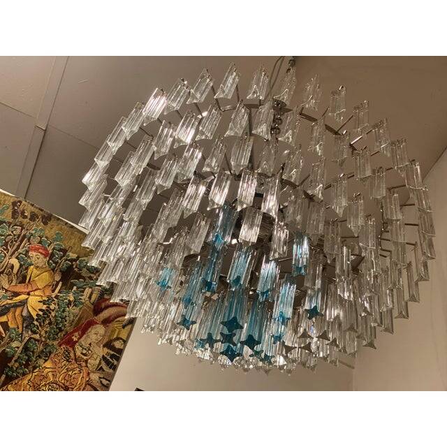 Contemporary transparent and ligh-blue triedro murano glass chandelier