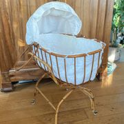 Bamboo, rattan, wicker cradle bassinet from the 1960s with a foldable support.