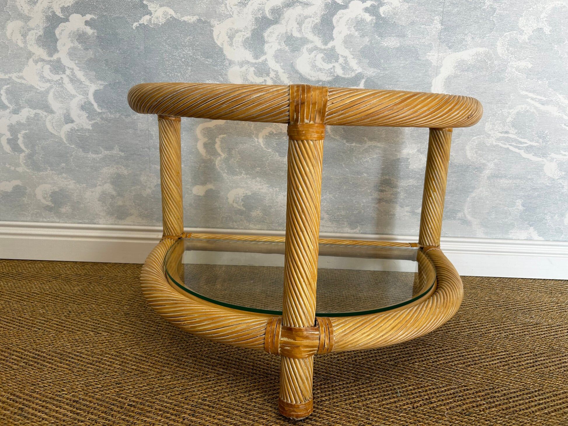 Two-tiered twisted rattan accent table with glass shelves, 1970s