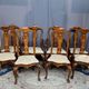 Set of two armchairs and six chairs. Marquetry with precious wood species.
