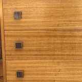 Mid-century brown teak chest of drawers with three drawers, tapered legs from the 1960s.