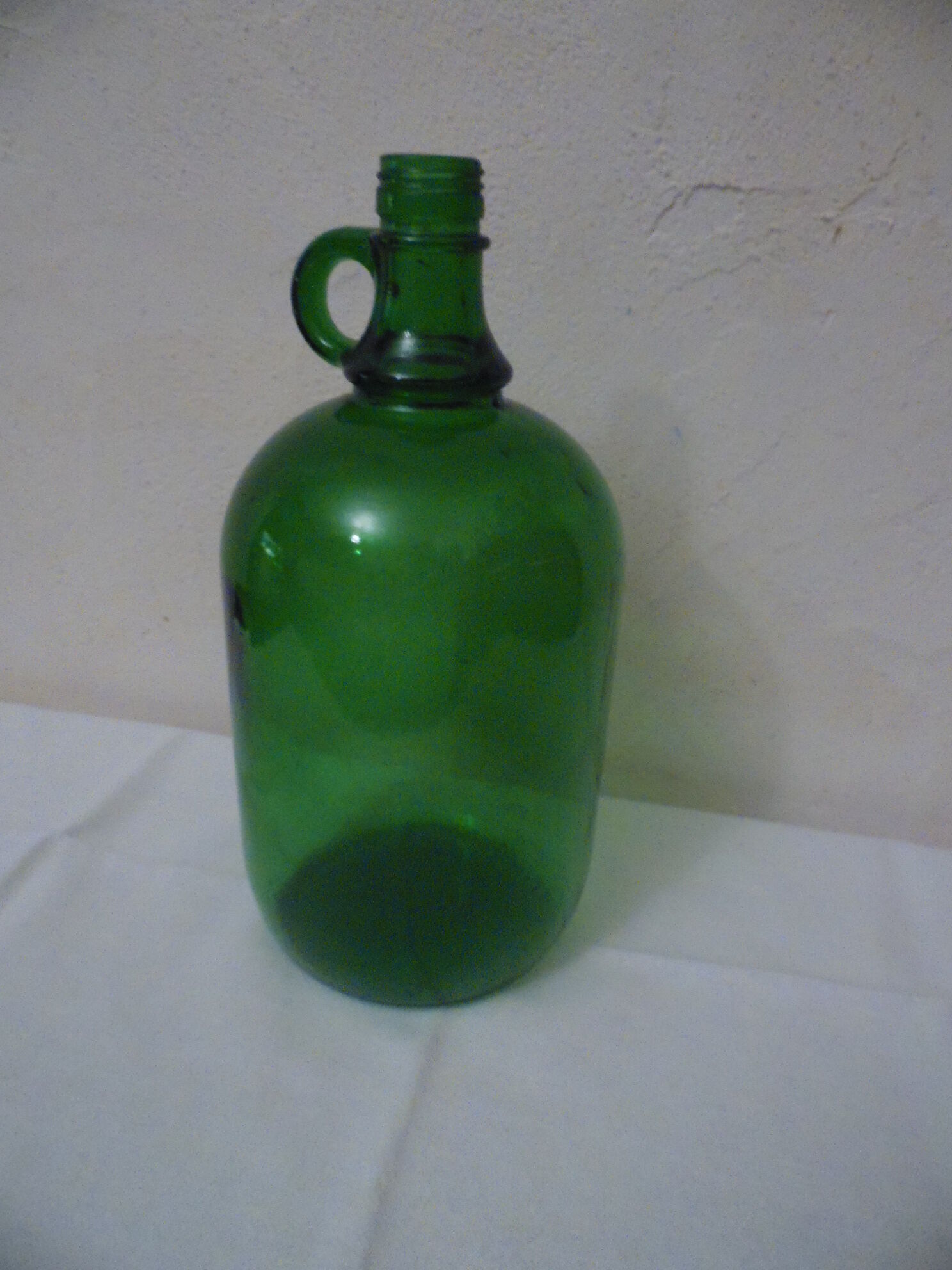 Cylinder glass handle a transparent color dark green