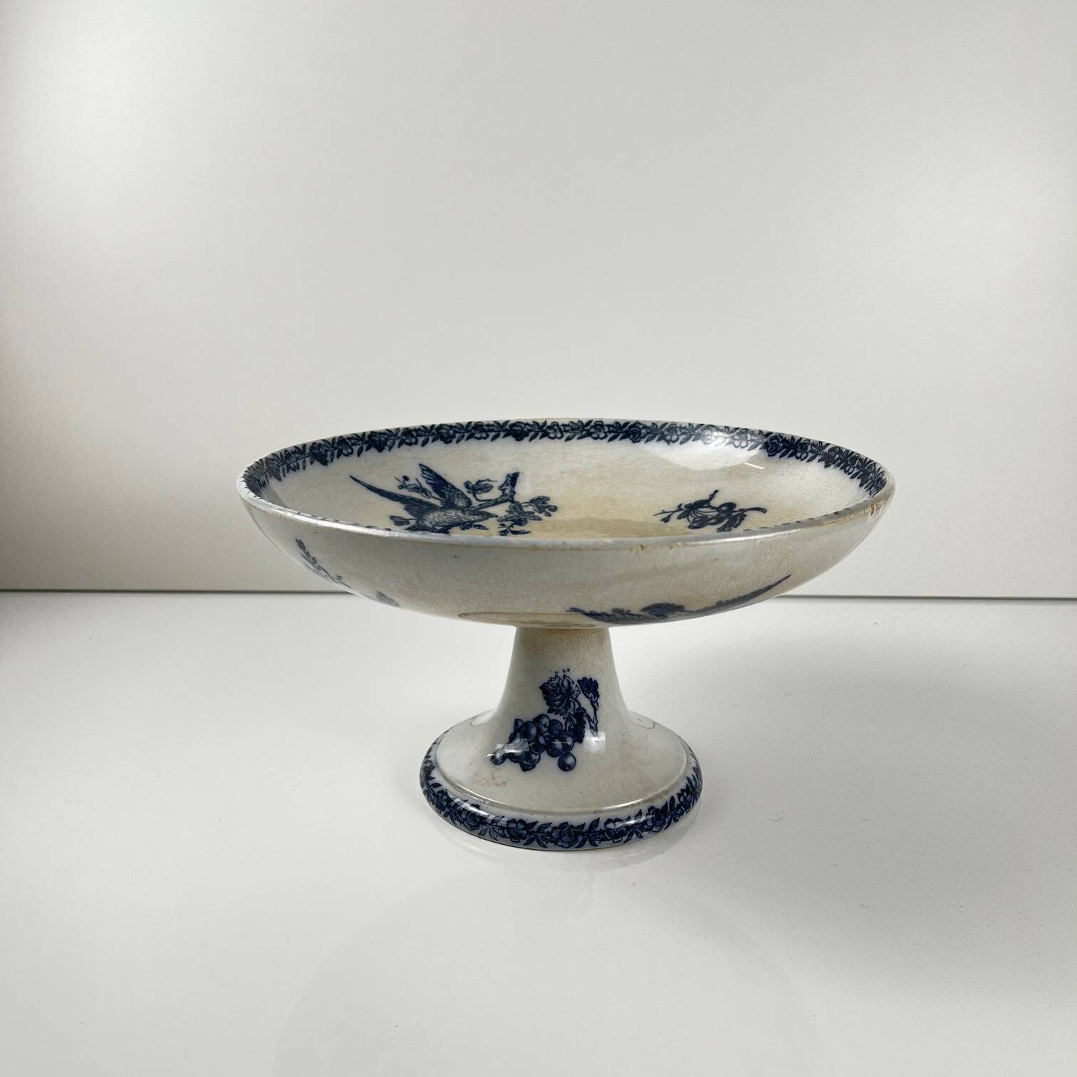 Pexonne iron earth compote dish, blue bird motif, late 19th century