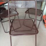 vintage perforated metal folding chair –