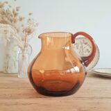Antique amber glass pitcher